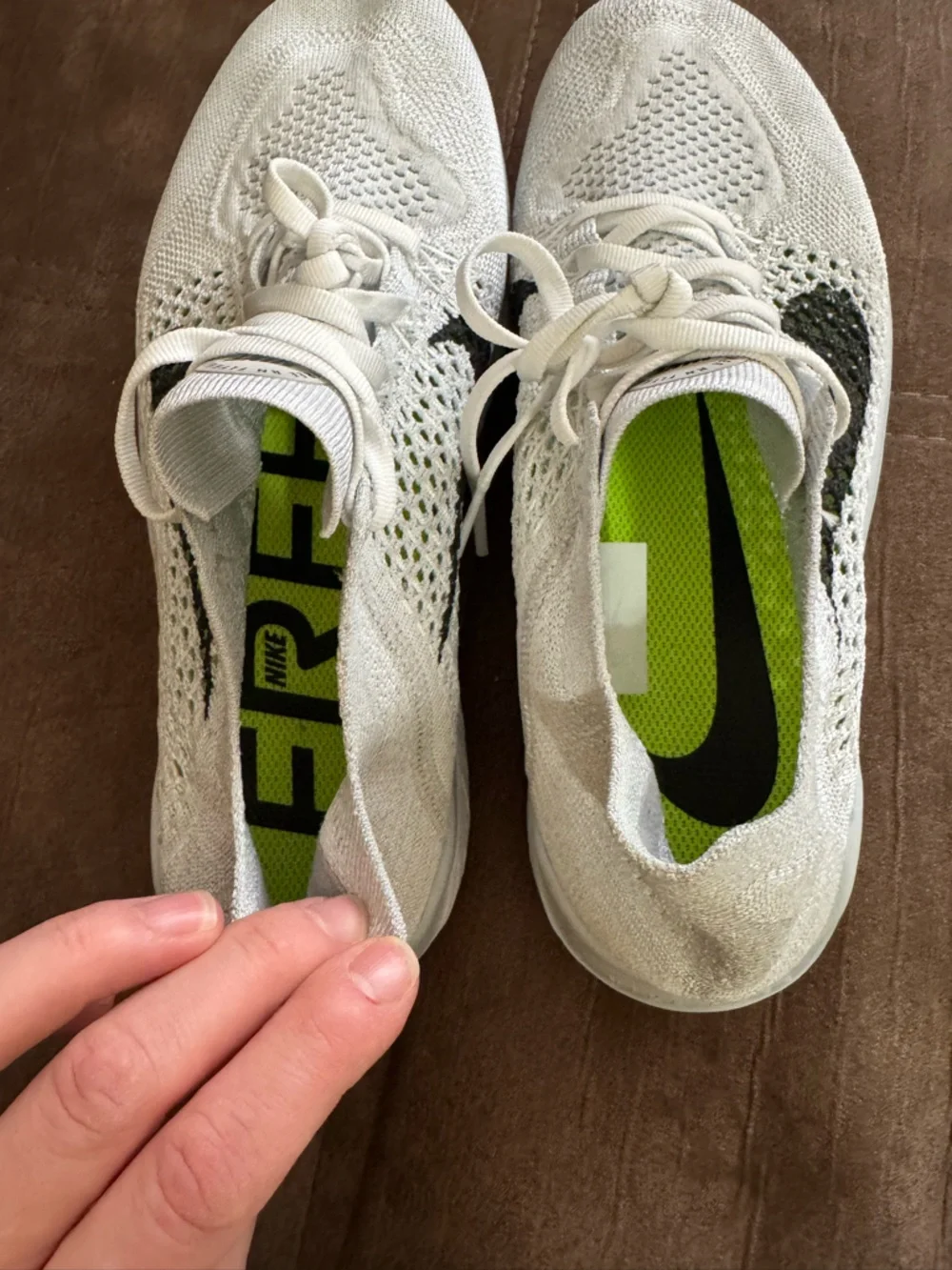 Nike Women's White Flyknit Running Sneakers with Black Swoosh - Picture 3 of 7